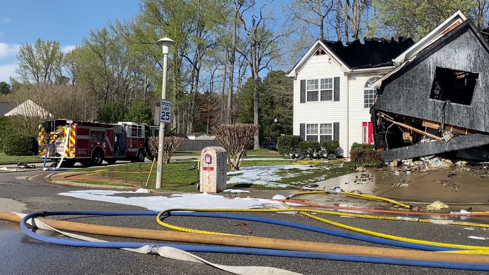 Fire erupts after car crashes into home in Hampton | 13newsnow.com