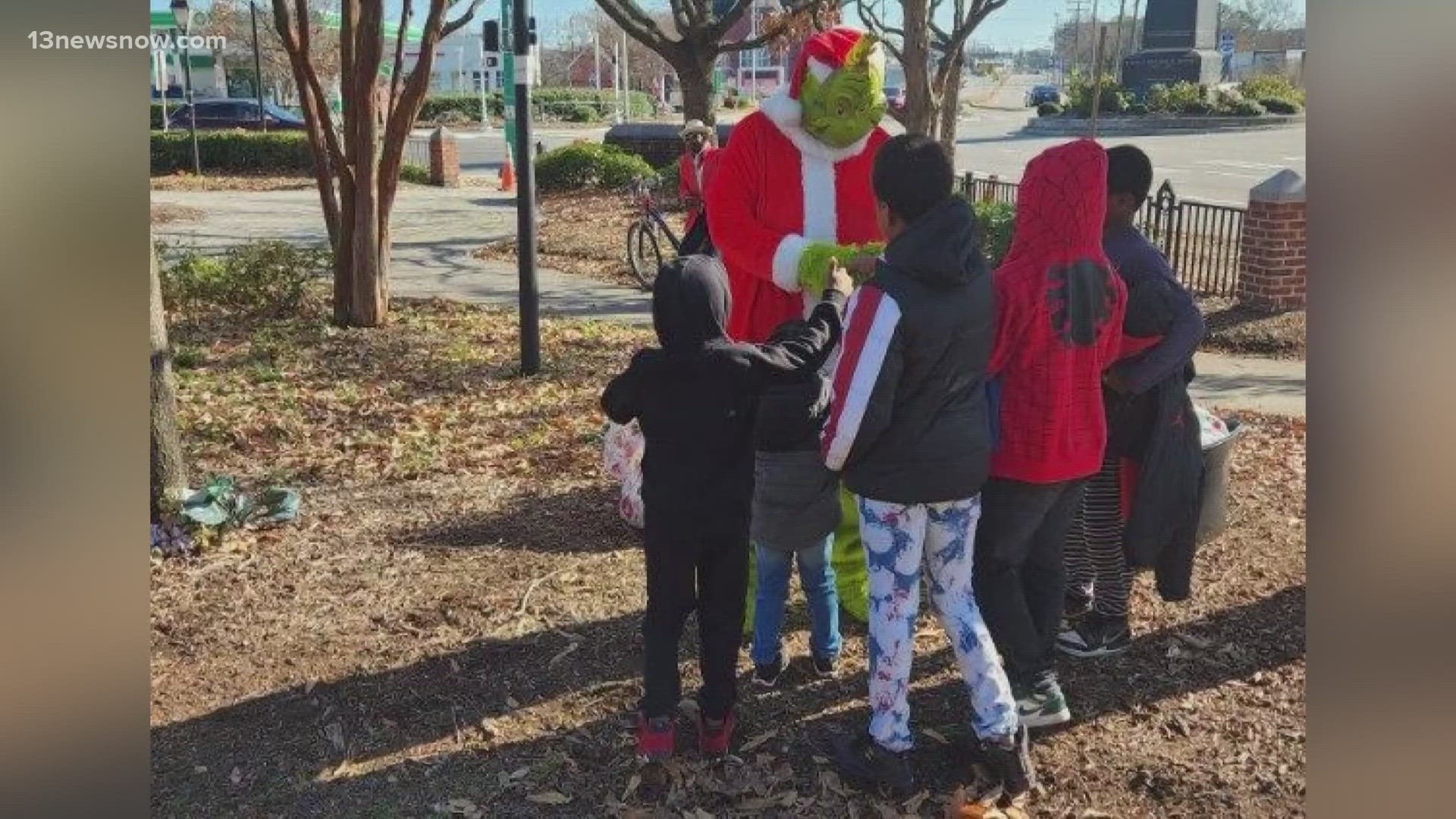 Individuals gathered at the Martin Luther King Jr. Plaza Sunday afternoon to sit down for an early Christmas Eve meal.