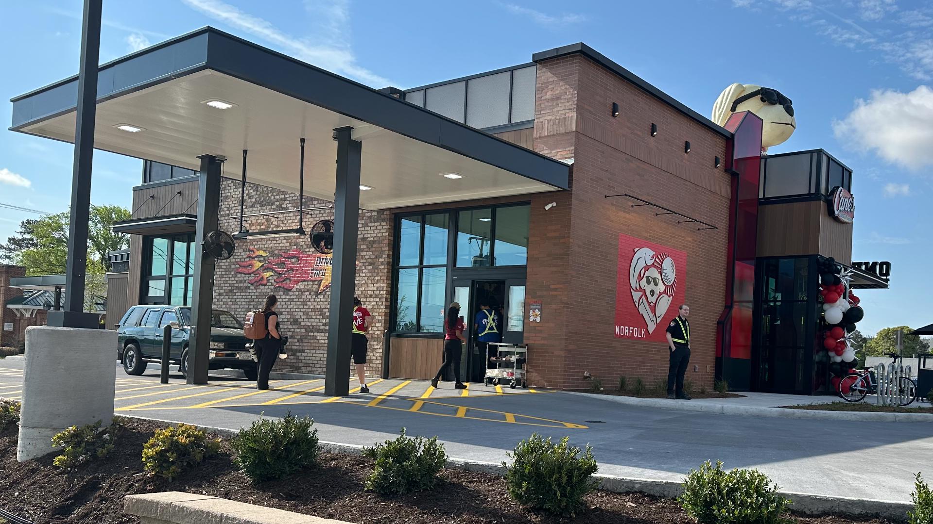 Protest and celebration outside Raising Cane’s grand opening in Norfolk ...