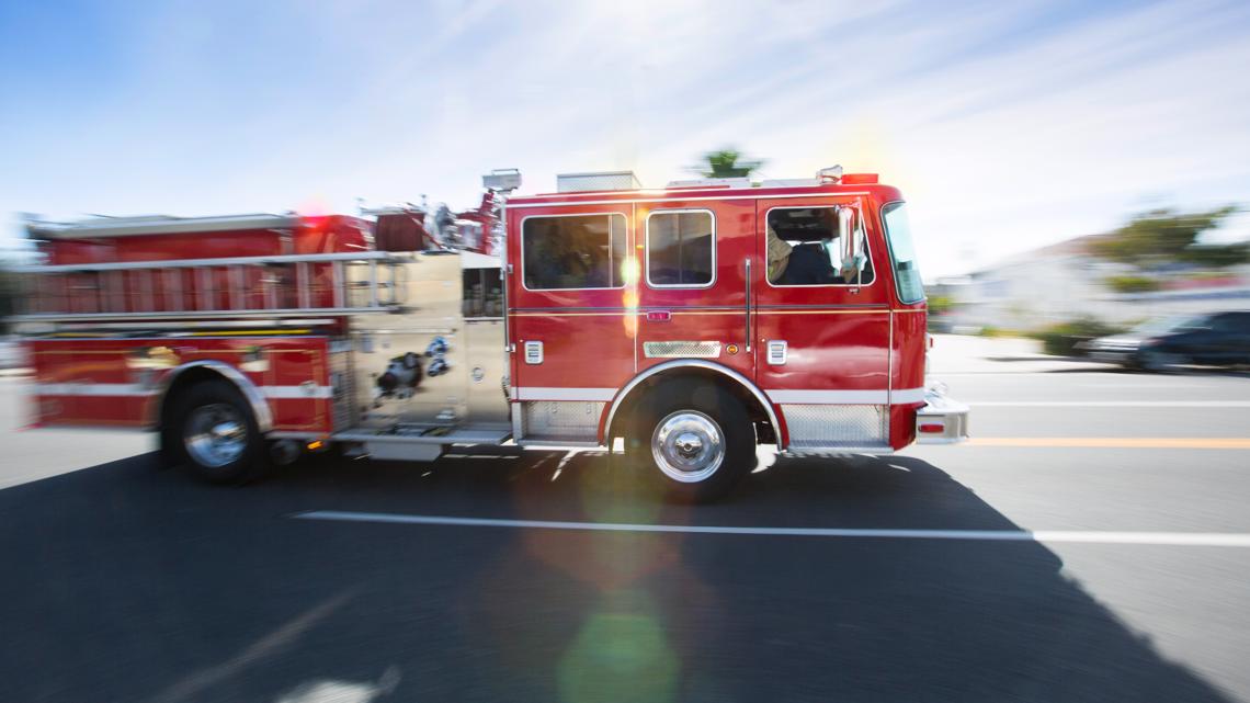 Two families displaced, firefighter injured following house fire in