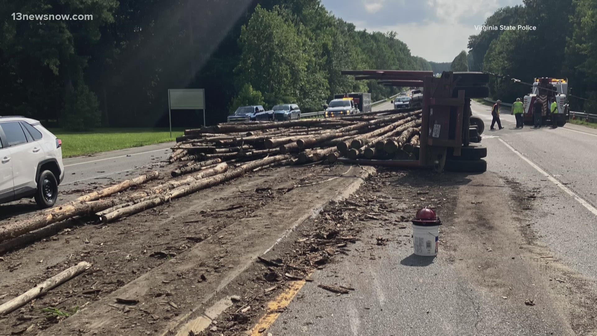 A log truck fell on its side after trying to turn from Route 17 onto Route 33. The logs rolled across the road toward oncoming traffic and hit four cars!