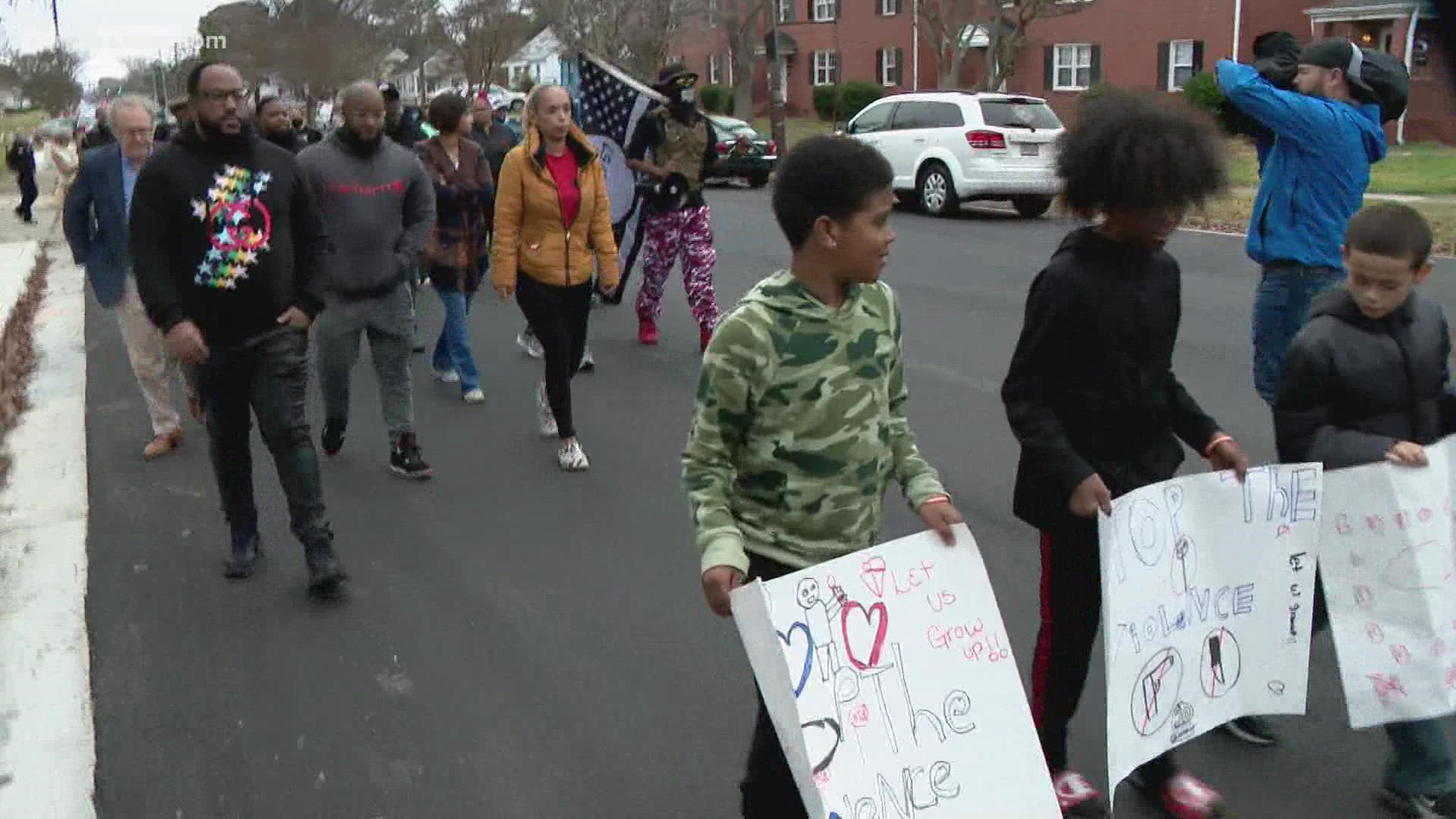 A Newport News Public Schools board member organized the march in effort to engage the community against violence.