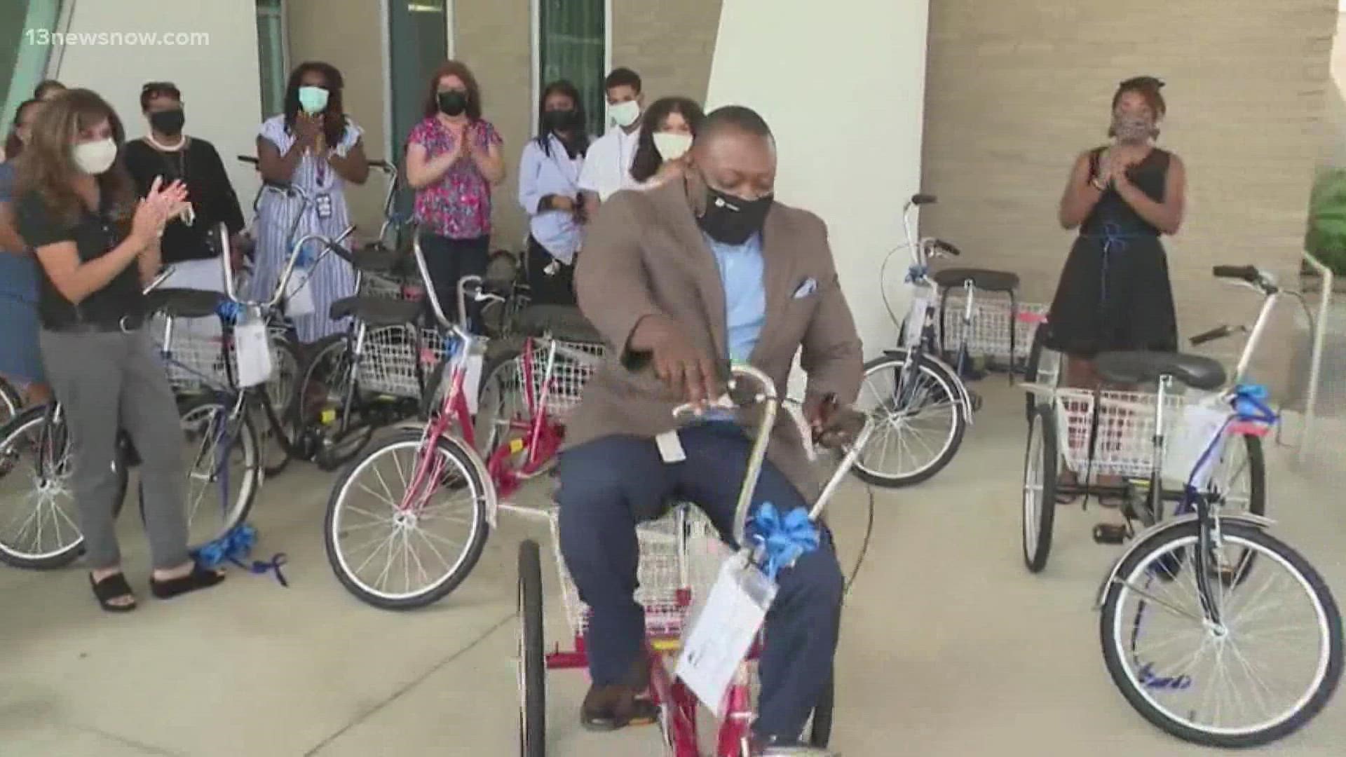 School division staff members will use the bikes to visit neighborhoods and deliver books directly to students.