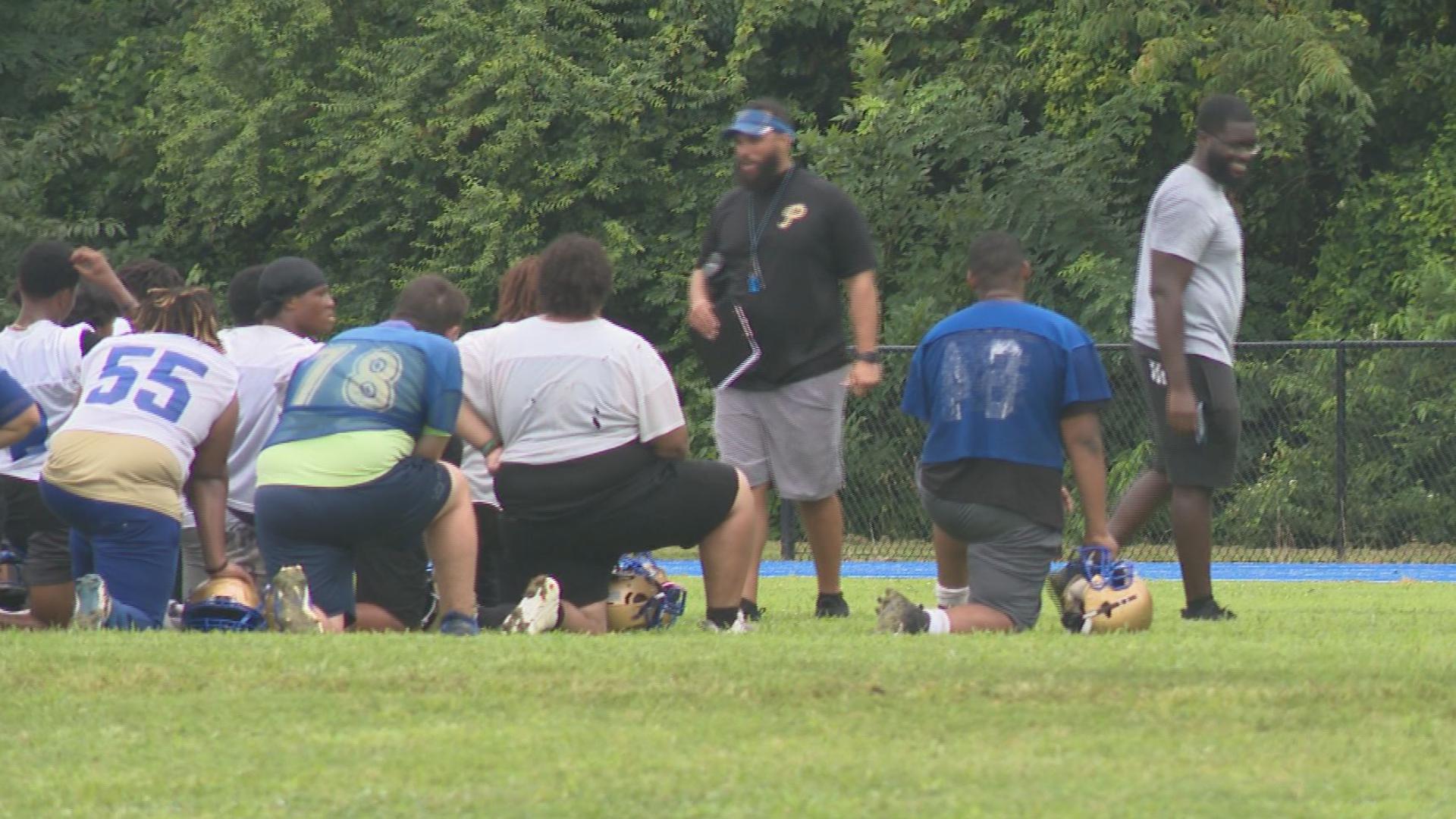 Head coach Jeremy Blunt talking to his players after practice. His Phantoms come into the season having won three straight state titles.