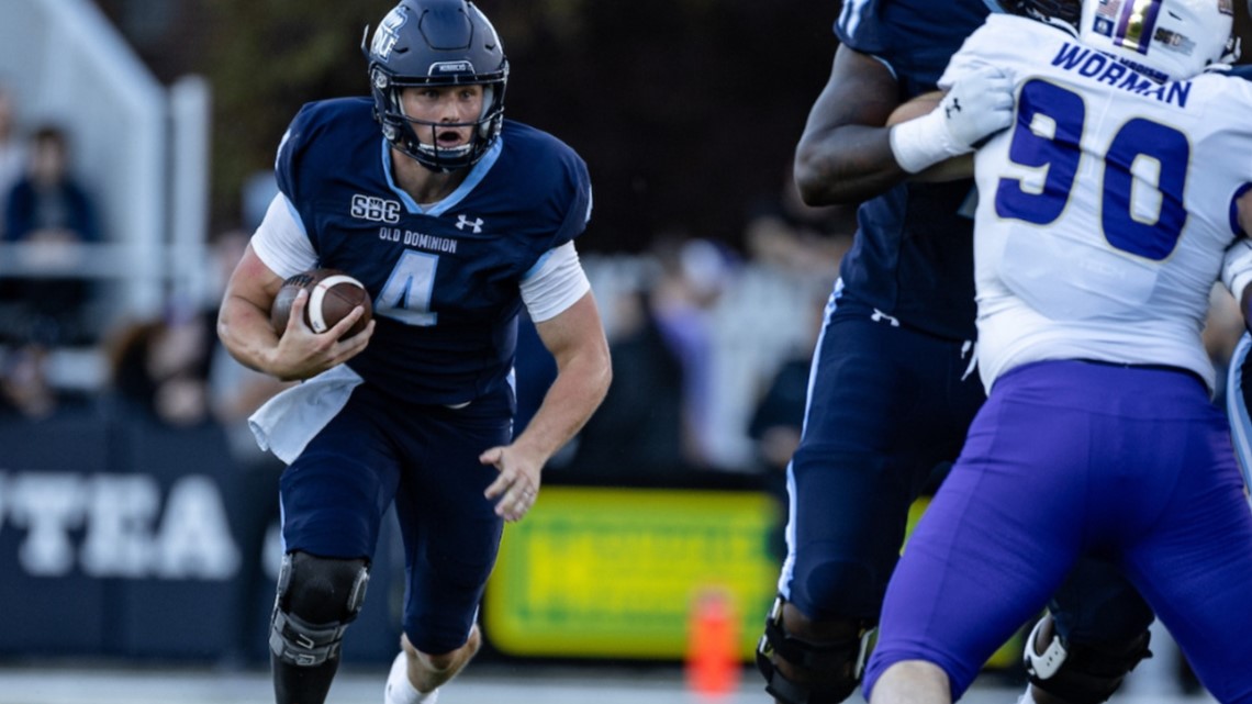 Former ODU quarterback Brendon Clark helps players