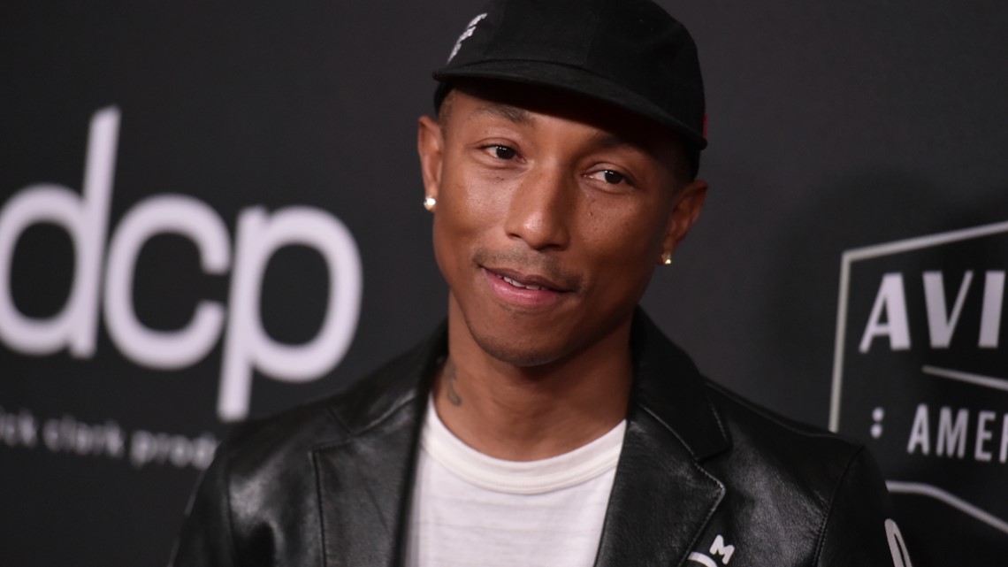 41 Pharrell Williams Host Charity Shopping Event For Children