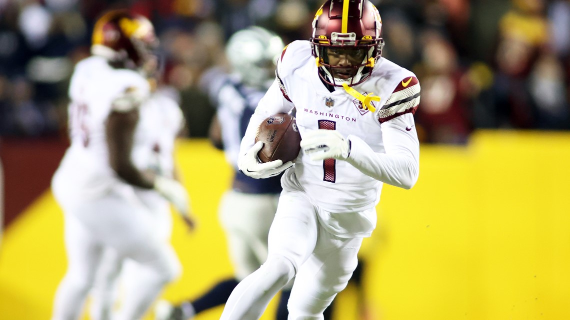 Washington Commanders quarterback Sam Howell (14) takes the field before  the start of an NFL football game against the Dallas Cowboys, Sunday, Jan. 8,  2023, in Landover, Md. (AP Photo/Nick Wass Stock