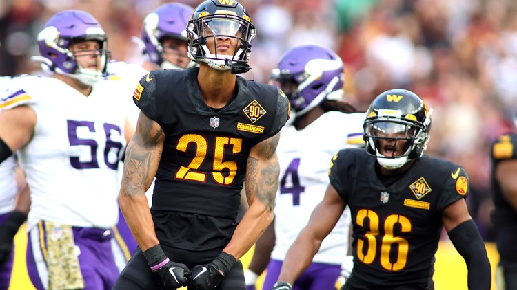 Minnesota Vikings linebacker D.J. Wonnum (98) reacting after sacking  Washington Commanders quarterback Taylor Heinicke during the