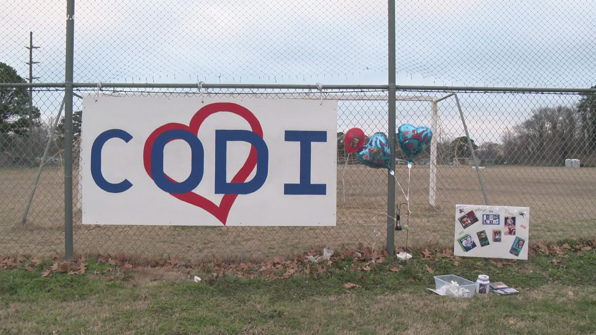 People in the community set up lit candles and placed signs, while praying for the Hampton boy's safe return.