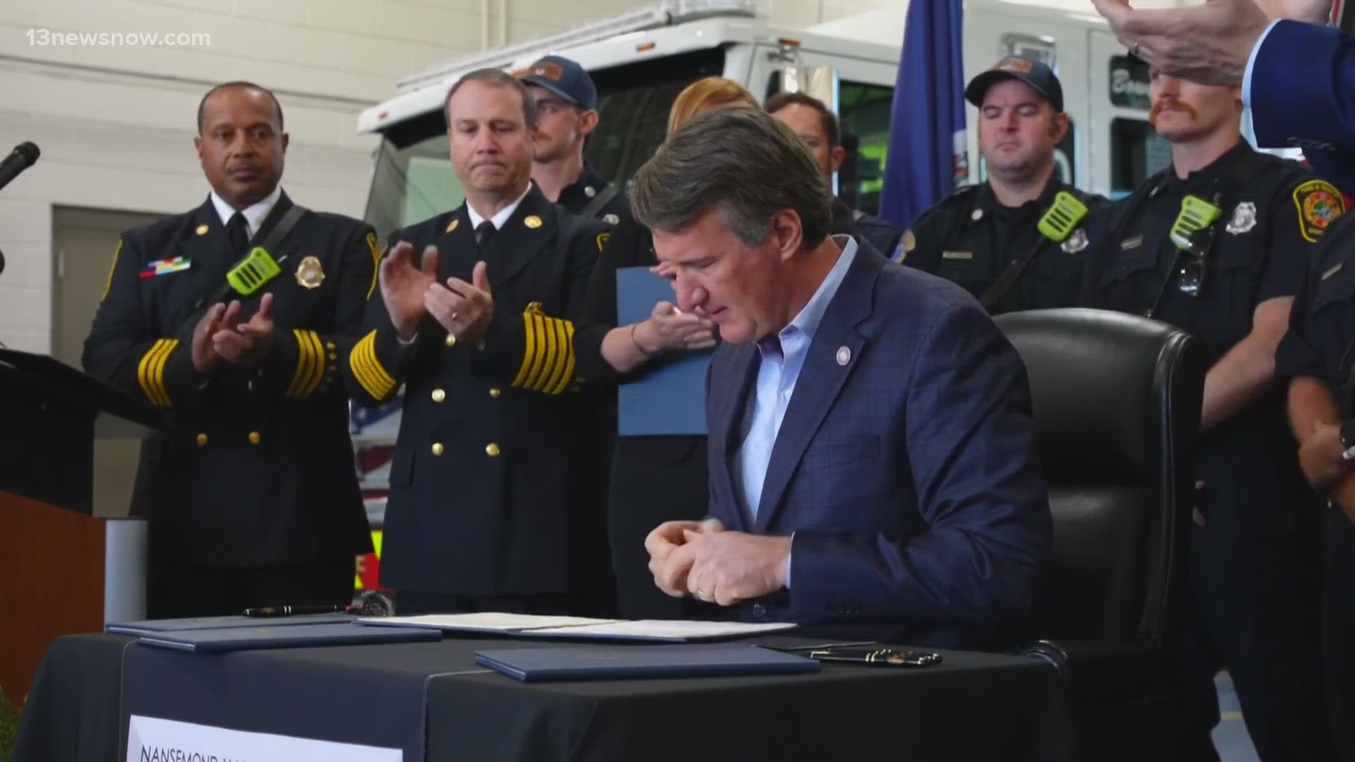 The Republican governor signed several bills aimed at helping Virginia's firefighters and first responders.