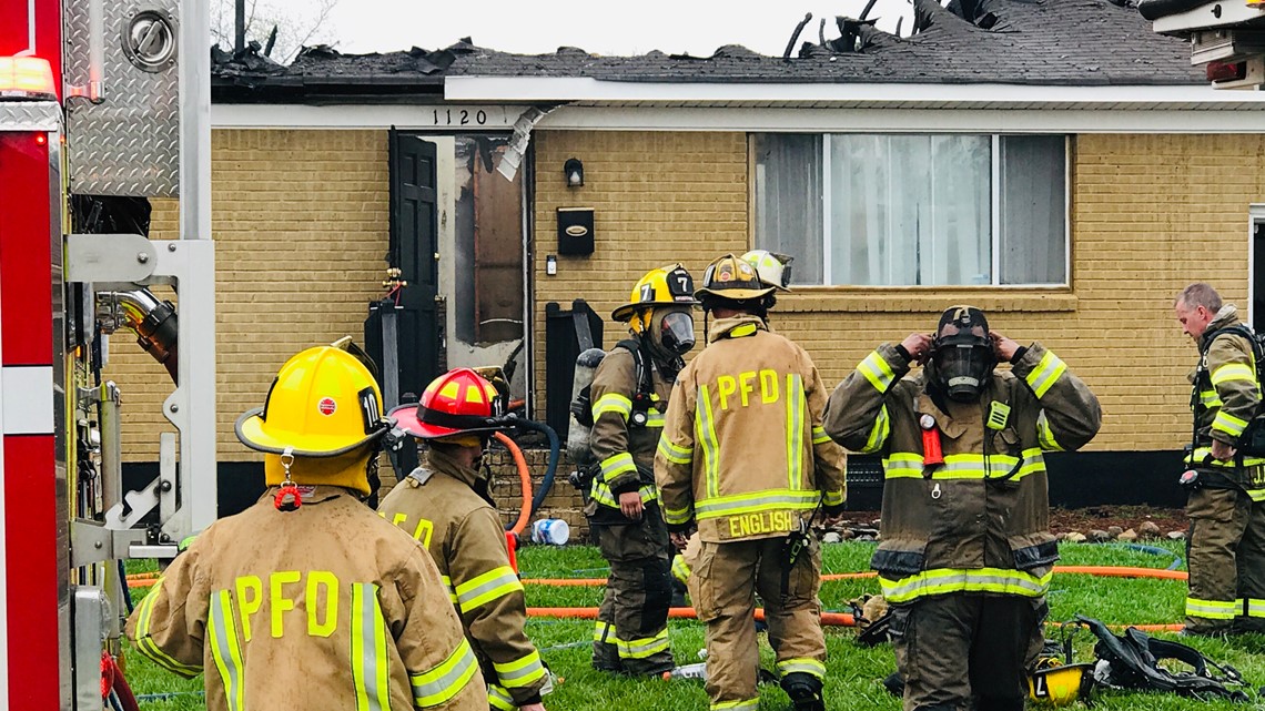 Firefighters battle house fire in Portsmouth