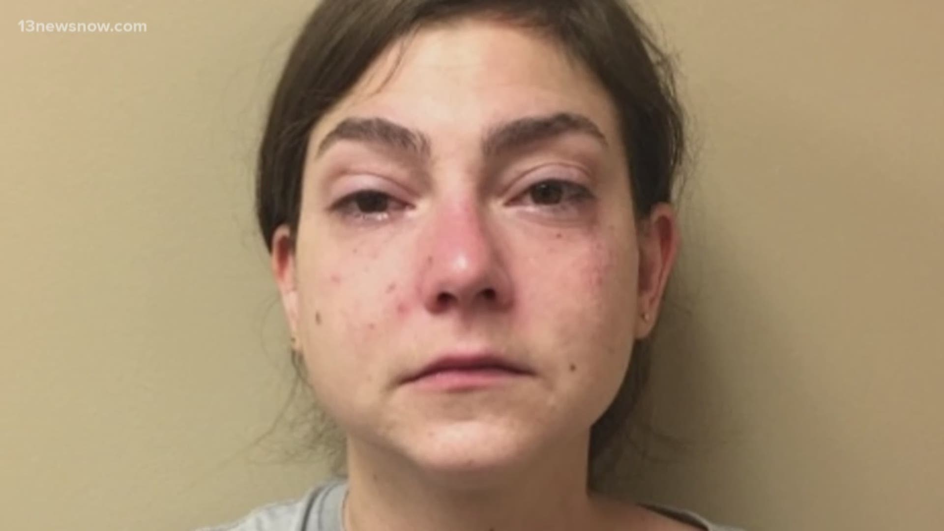 Christa Pohorence, 29, is accused of stabbing her 72-year-old mother to death. Police asked neighbors about the family Tuesday.