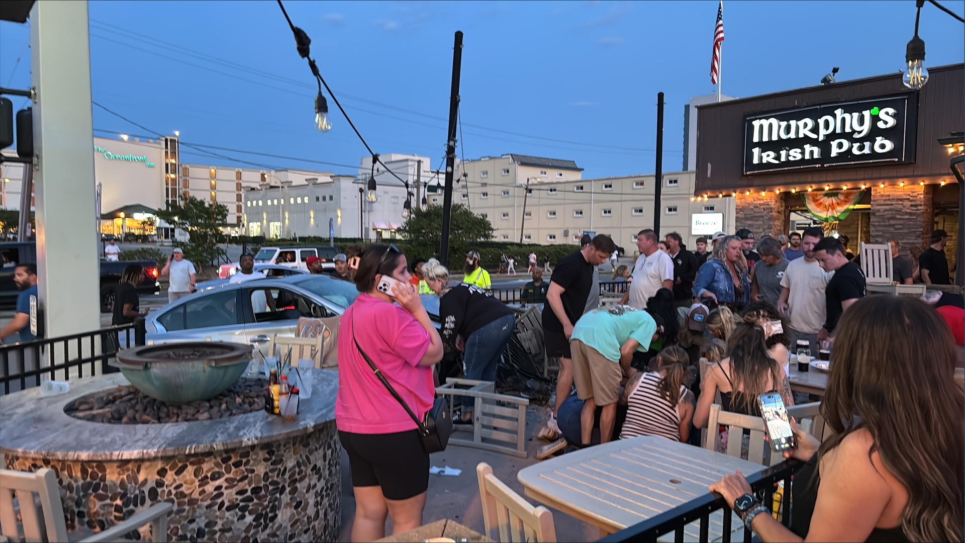 Car crashes into patio fence at Murphy's Irish Pub, multiple people ...