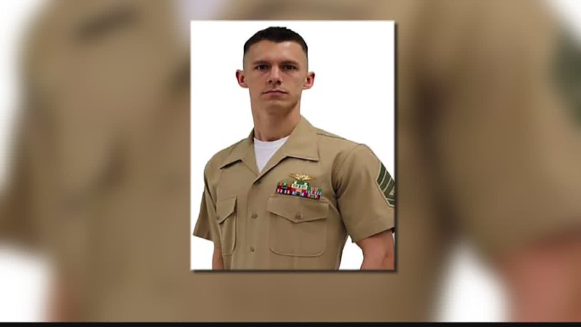 The U.S. Marine Corps said Gunnery Sgt. Mark Hopkins, who grew up in Chesapeake, was one of 16 service members who died when a military plane crashed on Monday.