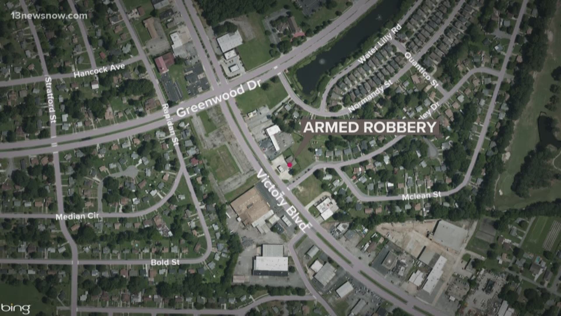 Officers are working to track down two men who robbed a convenience store in Portsmouth armed with a large knife.