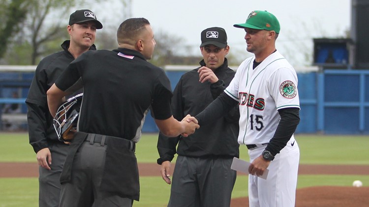 Buck Britton, manager of Triple-A Norfolk Tides throws during