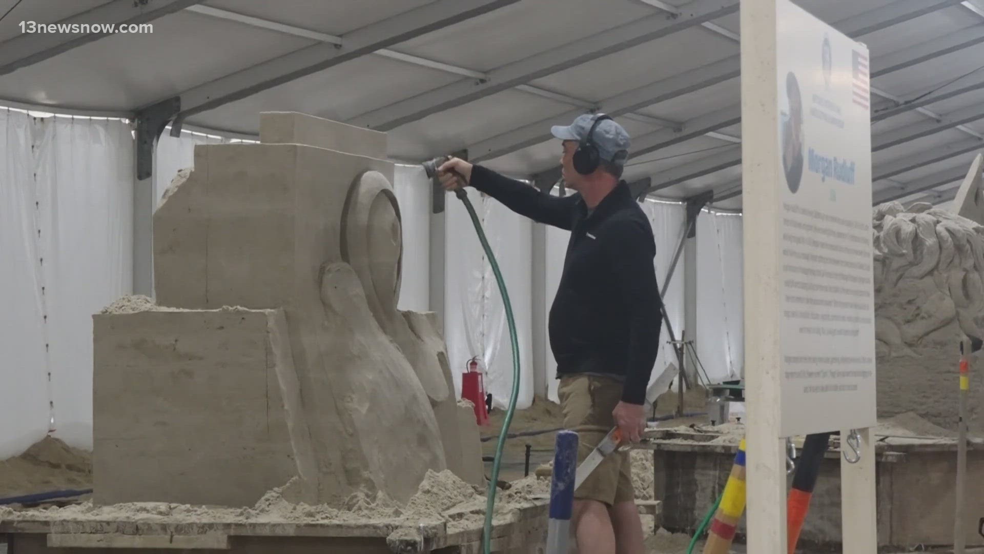 In preparation for the three-day event, crews moved sand off the boardwalk as well as set up flags and other decorations.