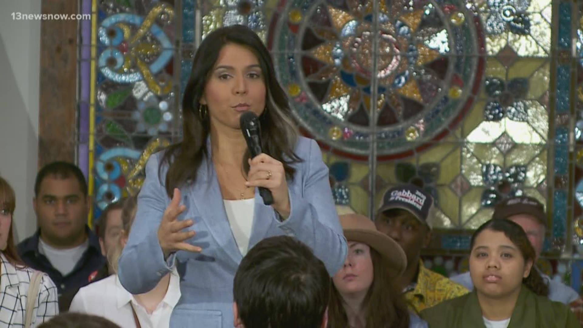 Rep. Tulsi Gabbard spoke at the Virginia Beach Oceanfront while her opponents battled it out on the debate stage about 450 miles south in Charleston, South Carolina.