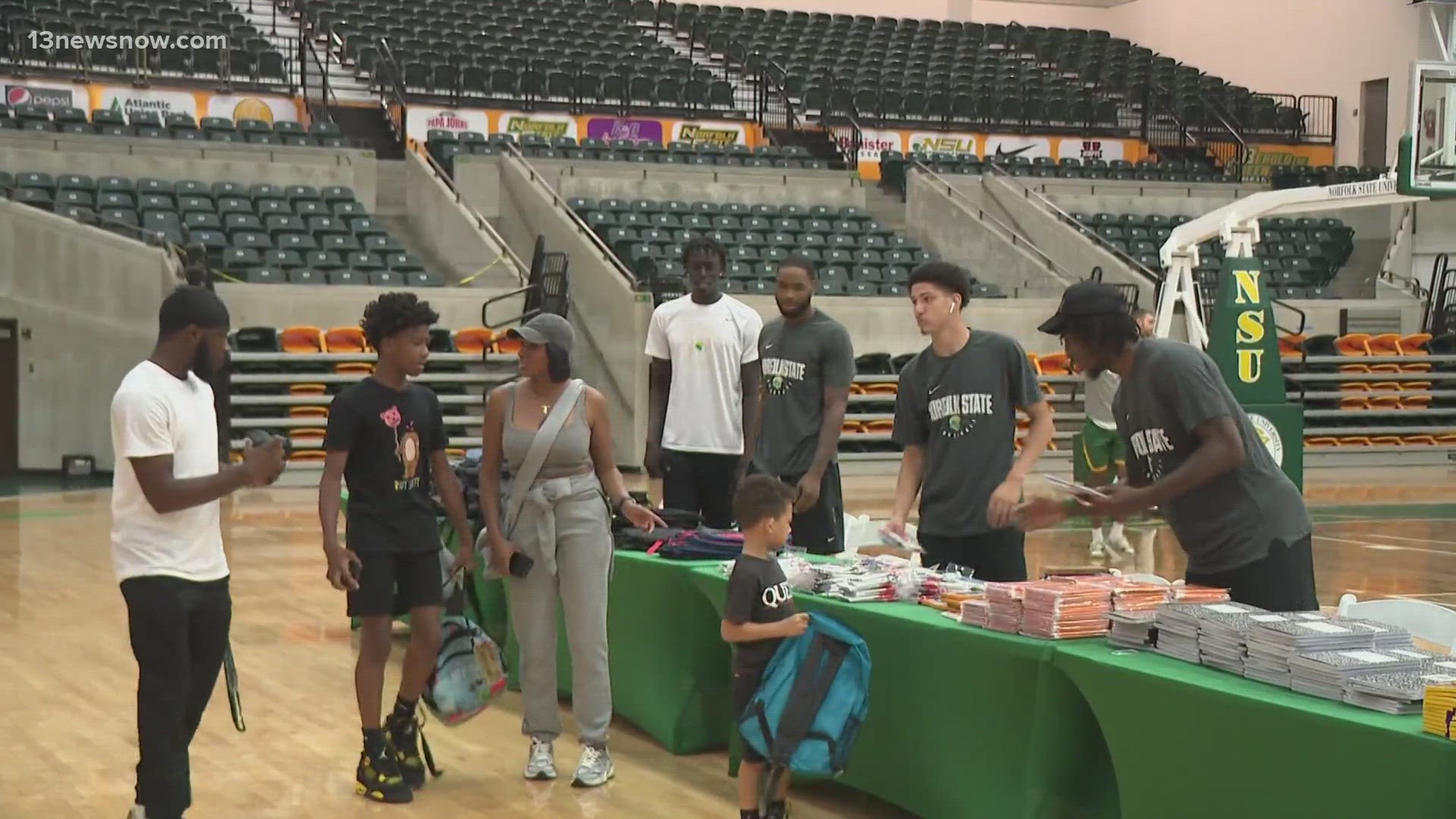 Attendees were able to receive free school supplies and the opportunity to meet the men's basketball team.