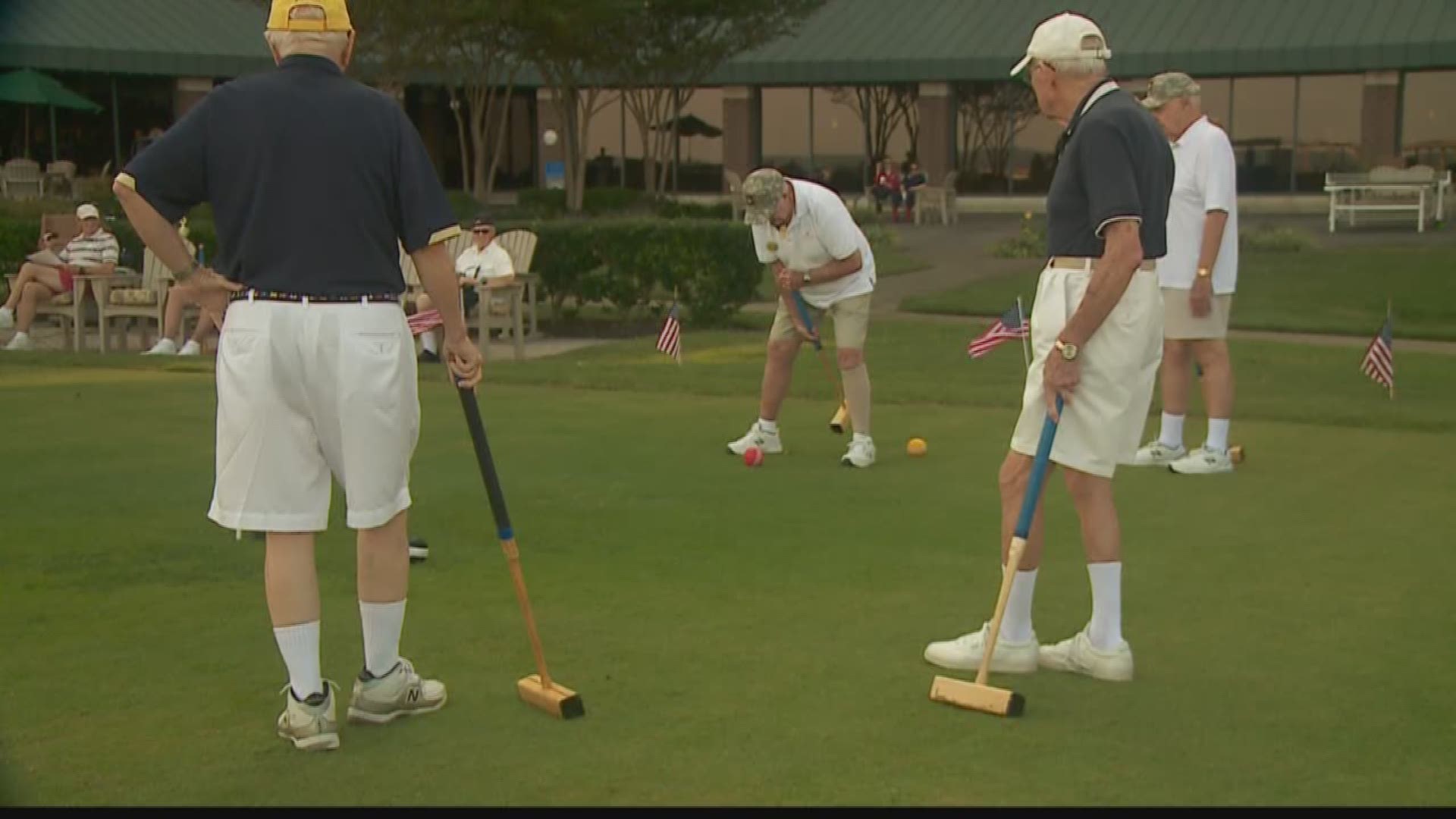 Army and Navy face off in a Virginia Beach Croquet tournament