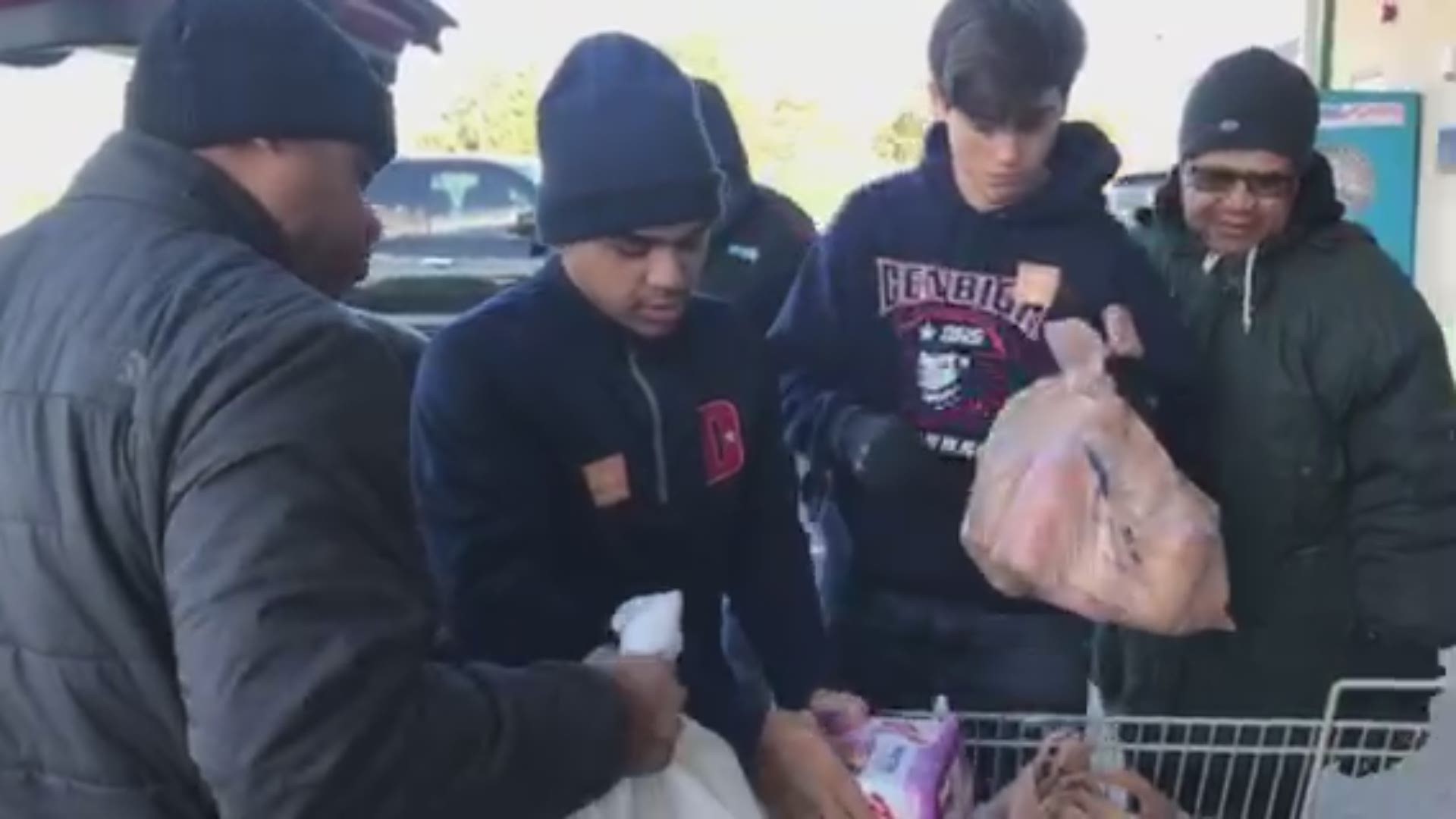 Volunteers help collect donations at the Virginia Peninsula Foodbank