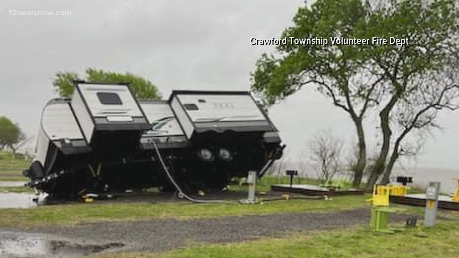 The Crawford Township Volunteer Fire Department said winds that came through Coinjock as part of a storm system blew over the campers at a KOA Holiday campground.