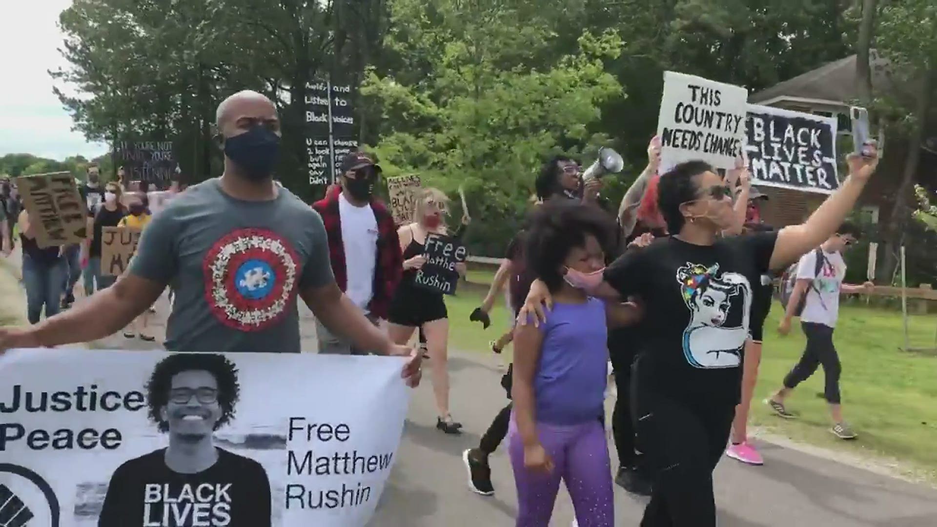 People gather at Mt. Trashmore in Virginia Beach in support of Matthew Rushin.