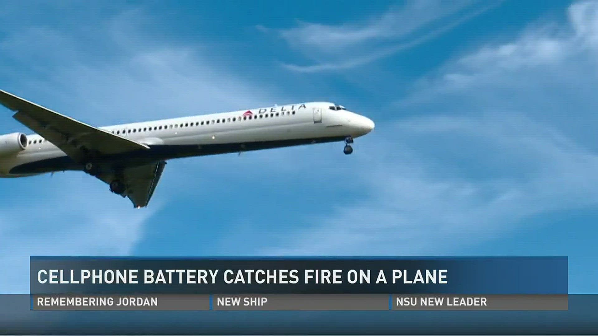 Cellphone battery catches fire on plane