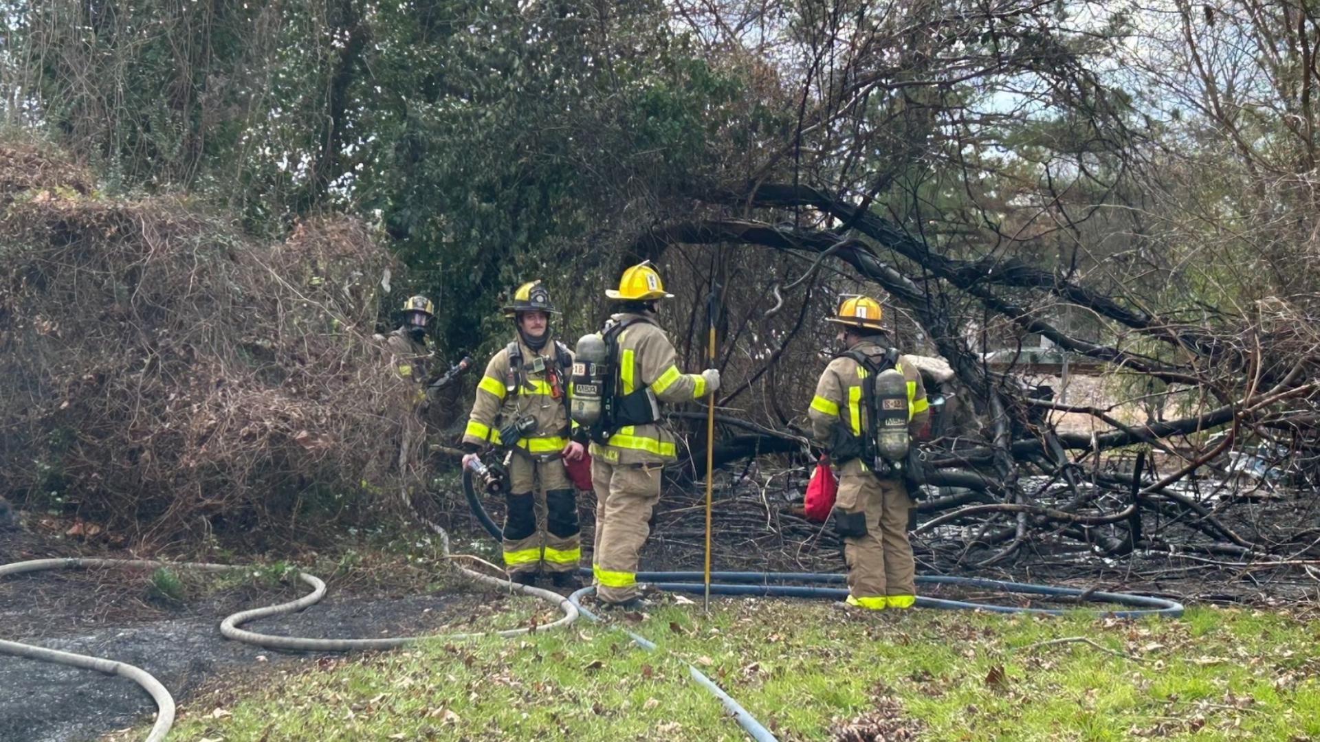 Norfolk fire crews swiftly contain brush fire behind Rugby Street homes ...