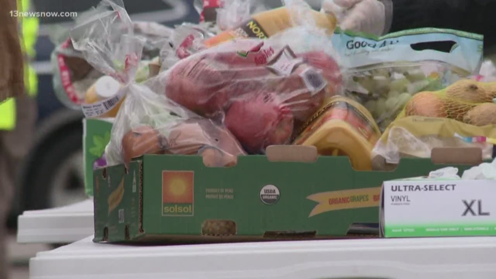 The Virginia Peninsula Food Bank is trying to help alleviate coronavirus-related food insecurity. It fed hundreds on April 1 with its Todds Stadium drive-thru.
