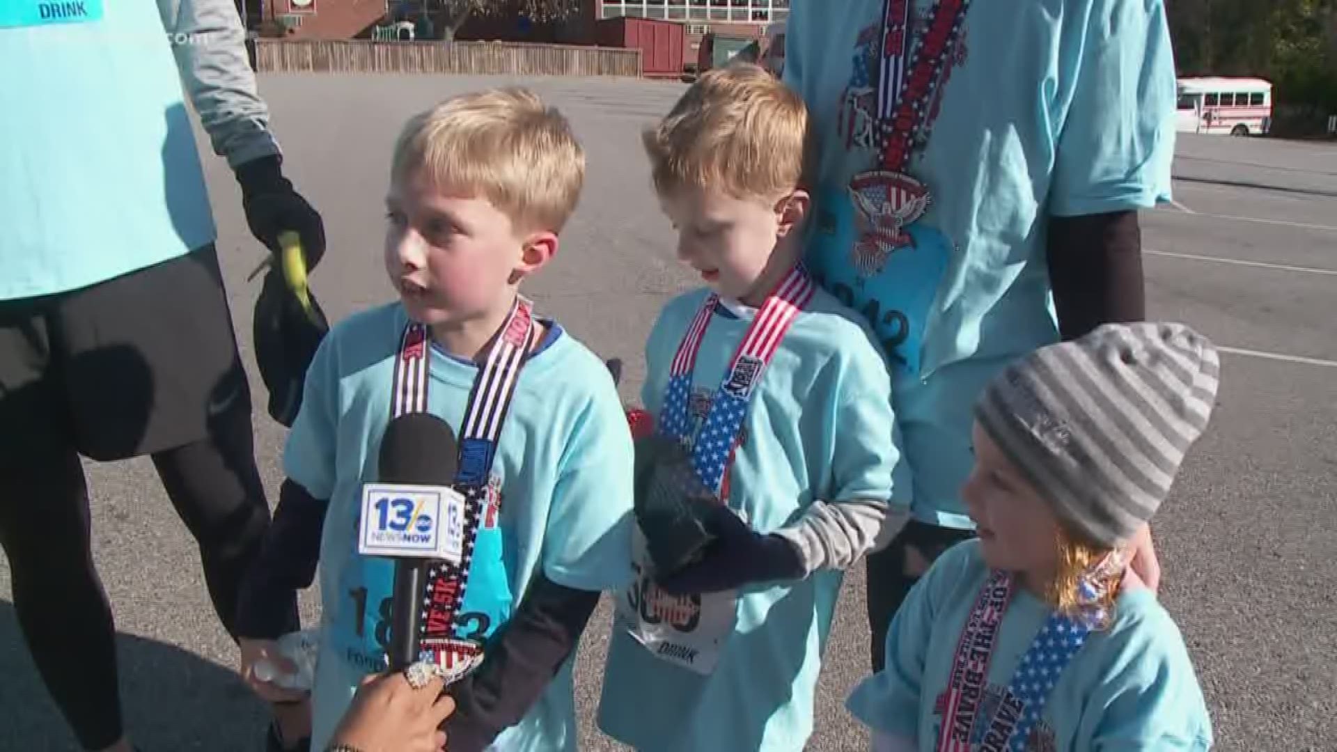 Participants of all ages wore red, white, and blue for the race across downtown Suffolk.