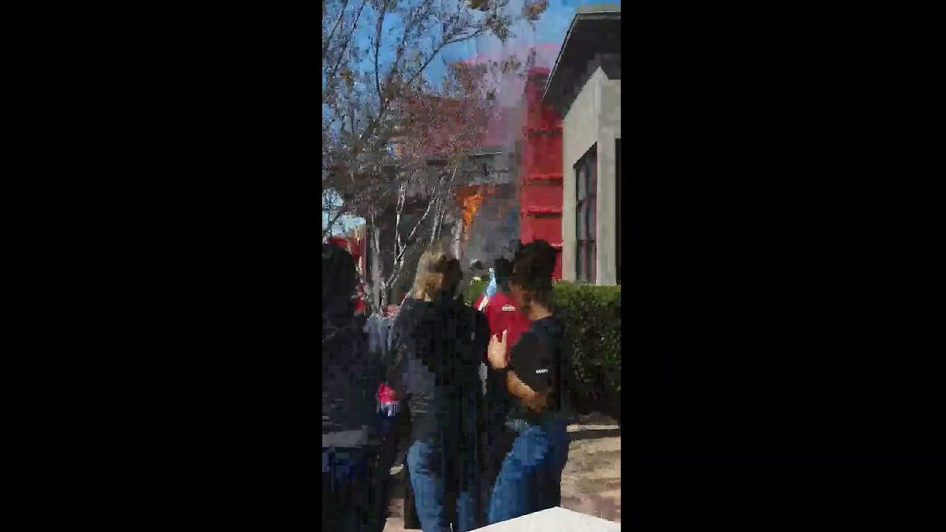 Firefighters work to extinguish a fire at a Red Robin restaurant in Newport News on Sunday, March 18 2018. Video courtesy Payton McClain