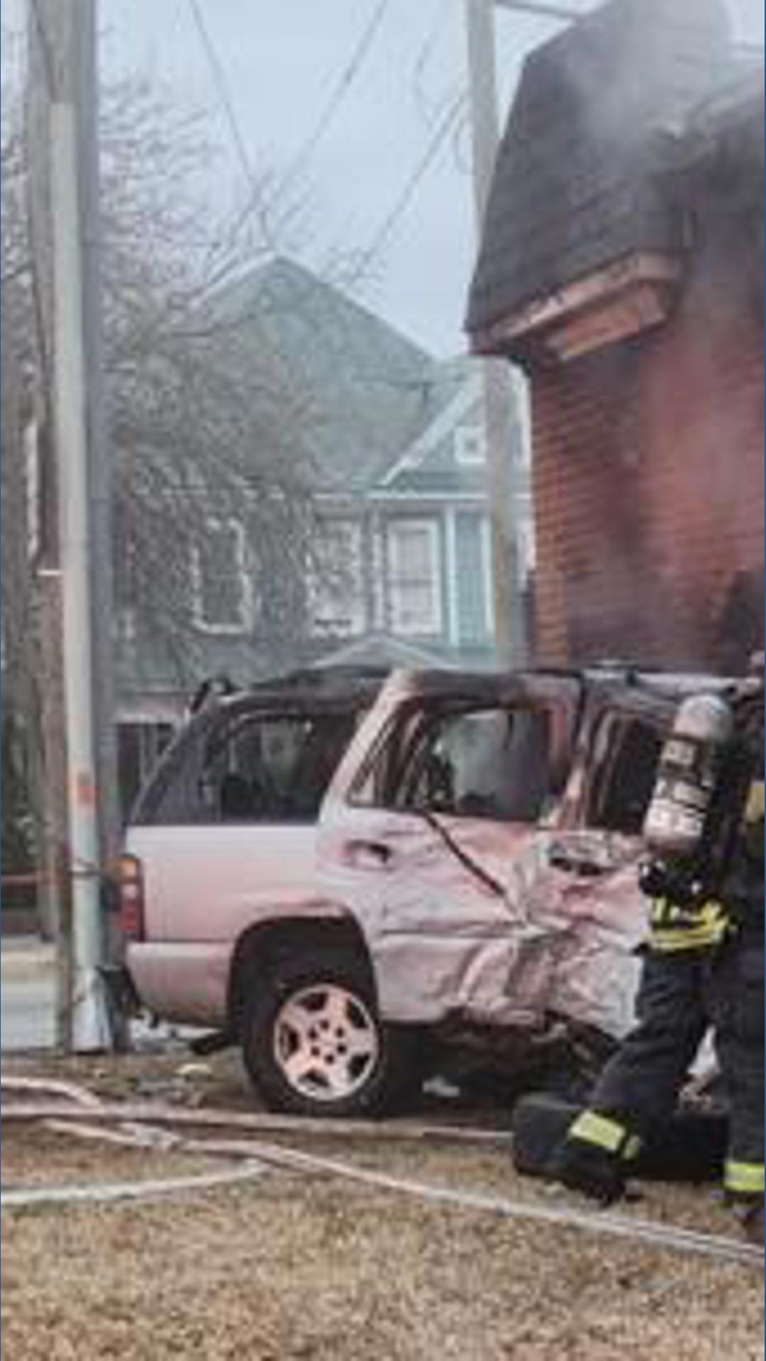 Driver seriously hurt after car crashes into Suffolk building, ignites ...