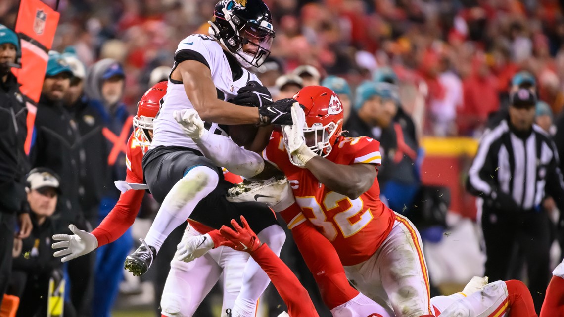 Kansas City Chiefs cornerback Jaylen Watson (35) celebrates an interception  against the Jacksonville Jaguars during an NFL Divisional Playoff football  game Saturday, Jan. 21, 2023, in Kansas City, Mo. (AP Photo/Ed Zurga