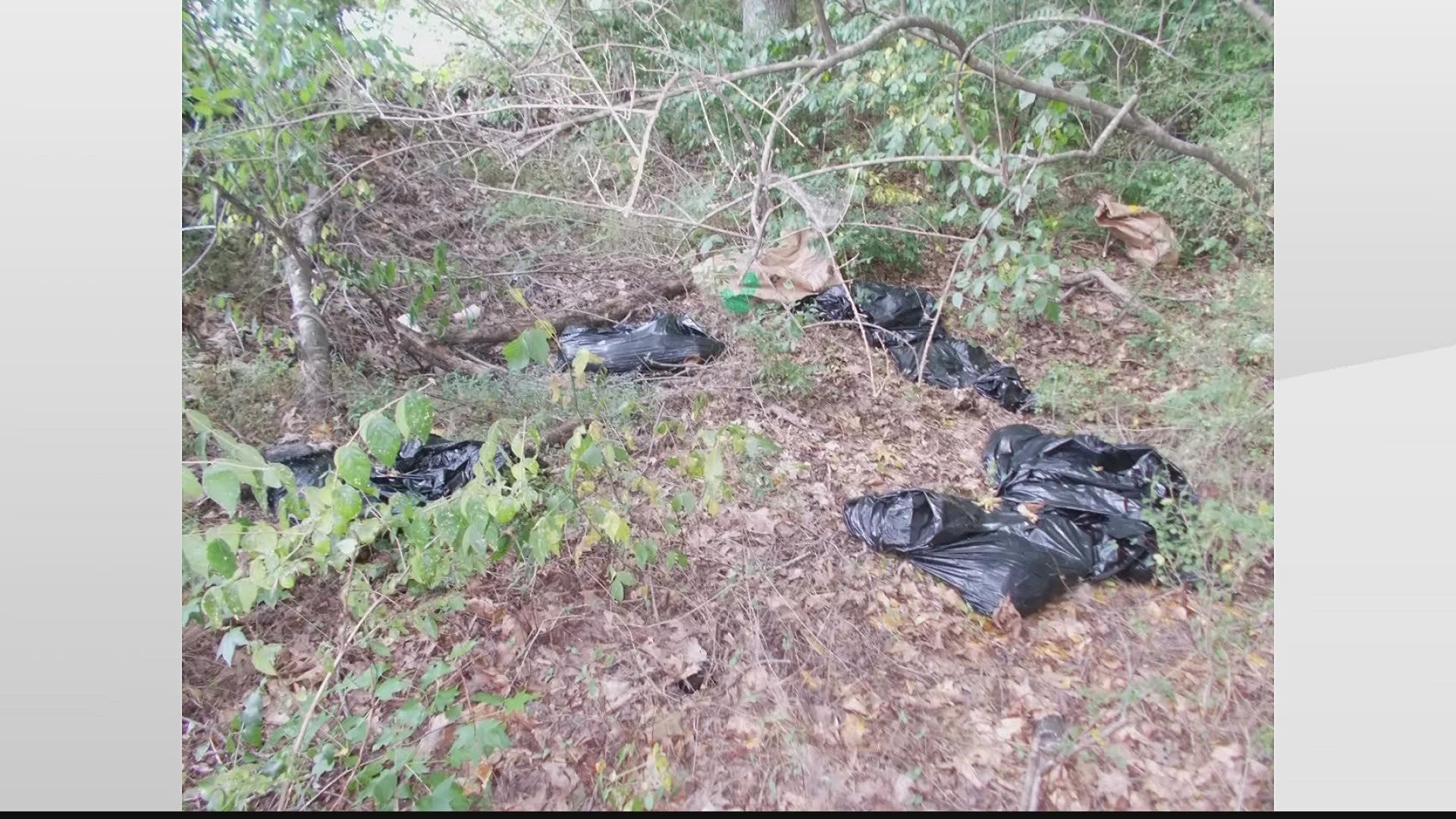 The discovery was made this week after a resident walking their dog noticed a black trash bag with an animal leg sticking out of it.