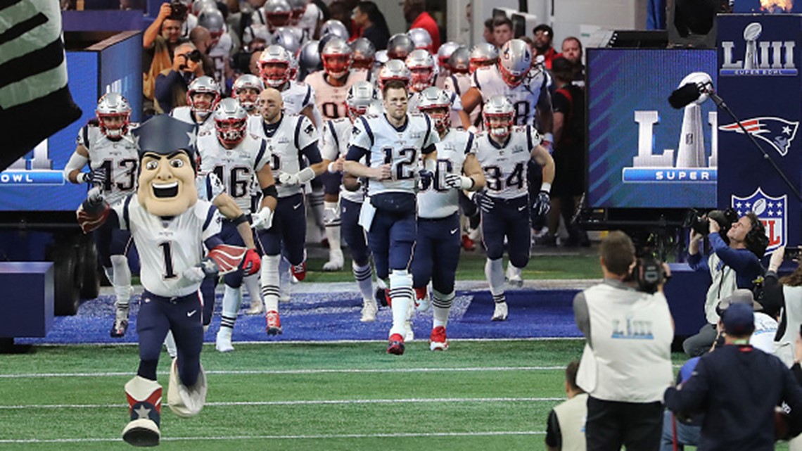 New England Patriots quarterback Tom Brady (12) walks on the field before  the start of Super Bowl LIII against the Los Angeles Rams at Mercedes-Benz  Stadium on February 3, 2019 in Atlanta.